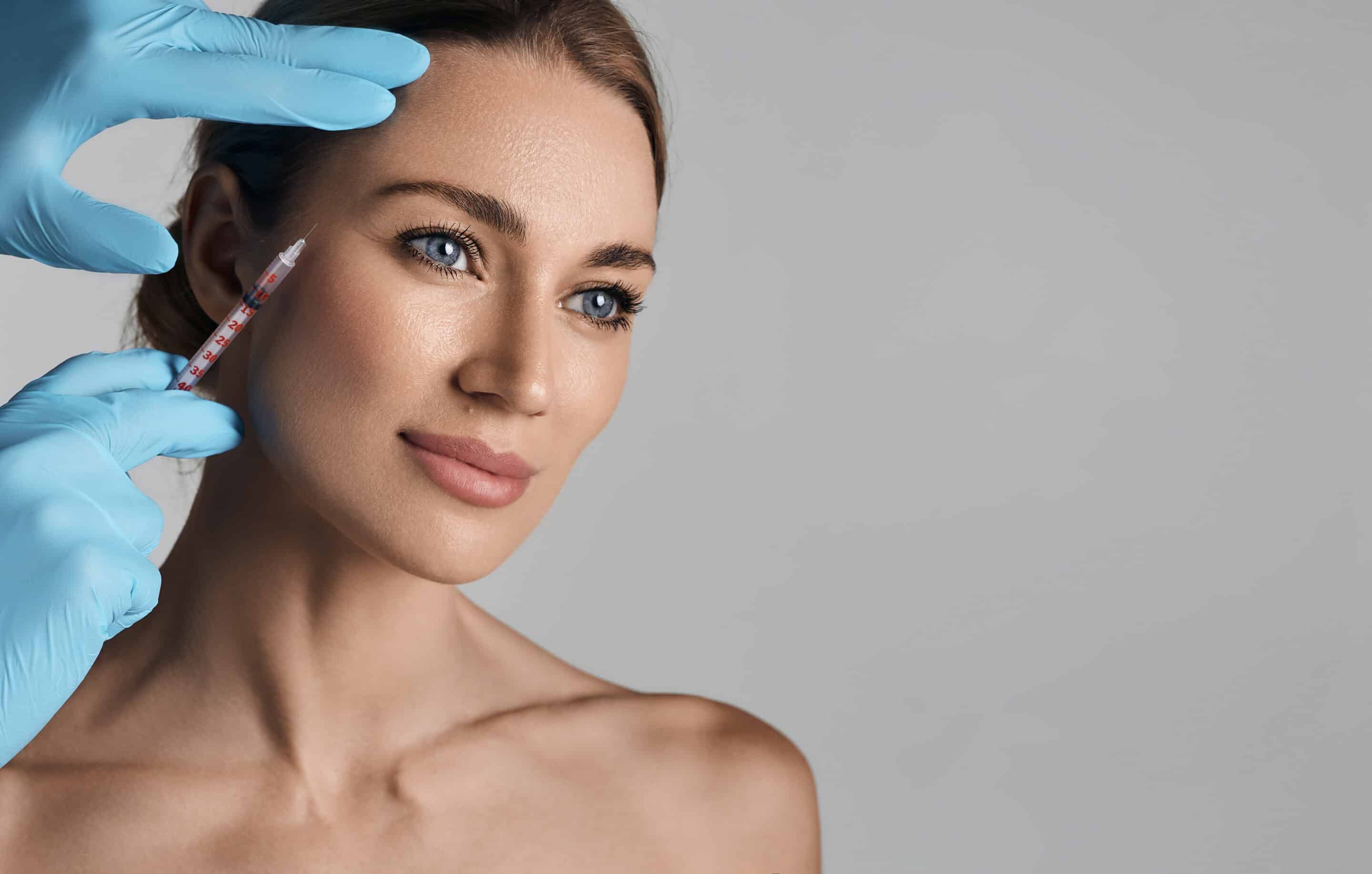 Are Botox and Fillers the Same? 21 beautiful woman during facial mesotherapy for smoo 2026 03 24 03 23 21 utc scaled